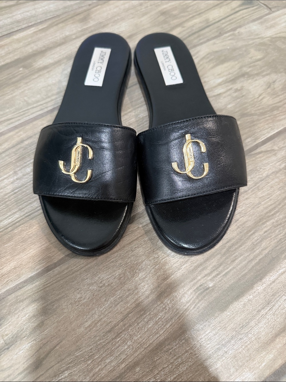 Jimmy Choo Black Leather Slide Mules with Gold JC Emblem